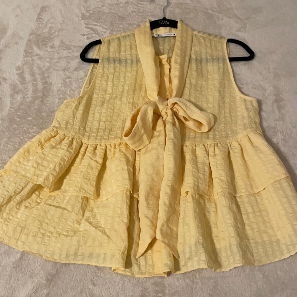 Yellow button down shirt